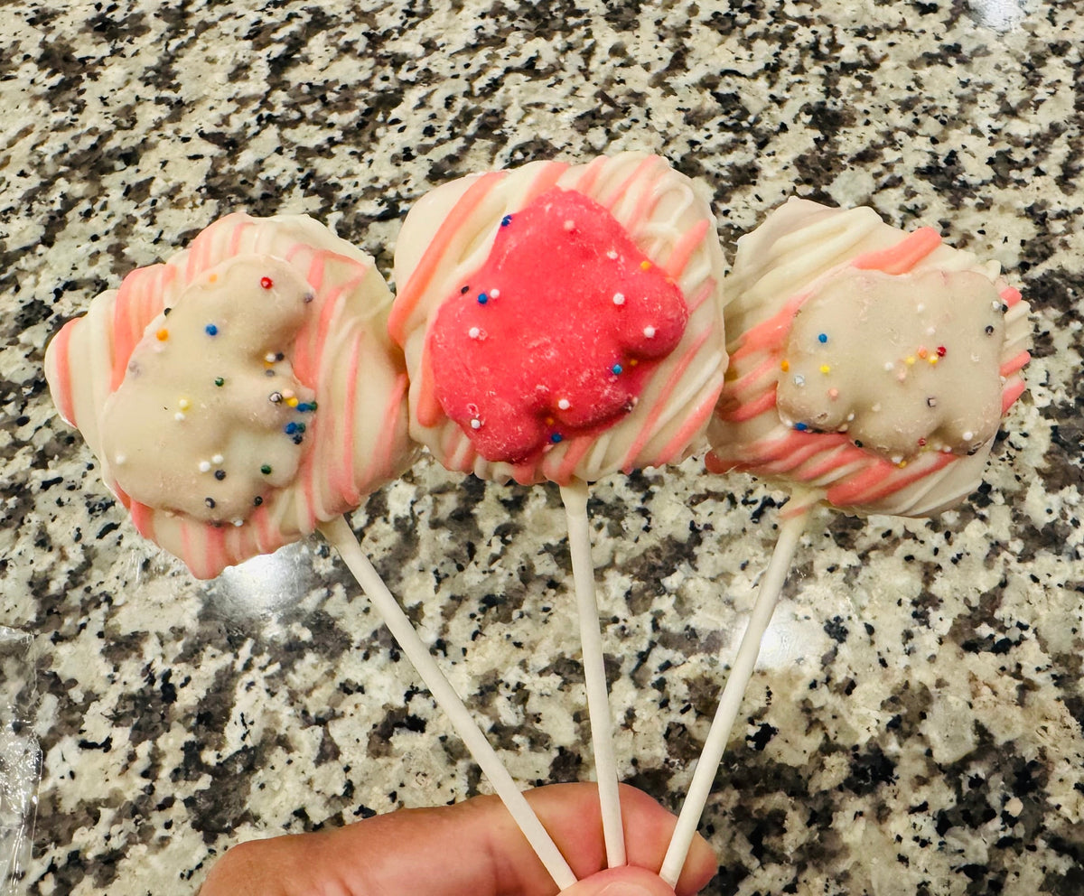 Frosted animal cracker cake pop